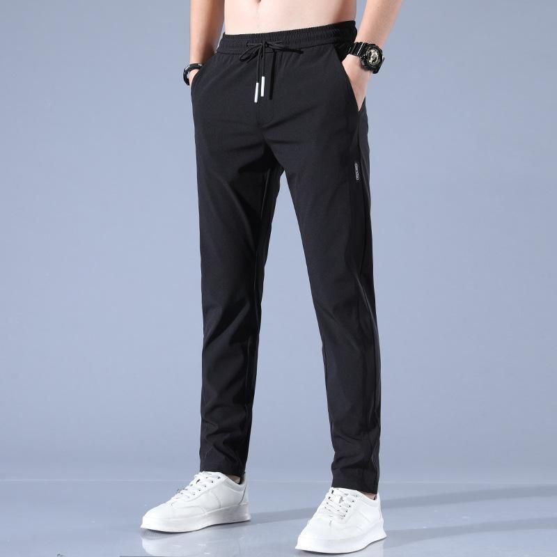 ELITEPRO™ COMBO OF 2 REGULAR FIT WATERPROOF LYCRA TRACK PANT WITH TWO SIDE POCKETS (BLACK & GREY) - WHOLESALE RATE